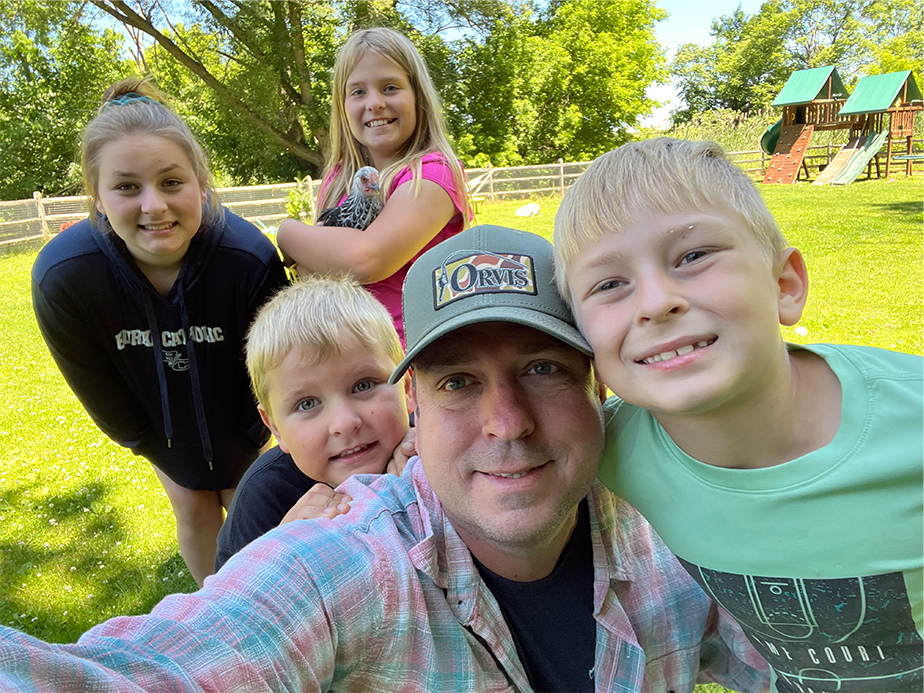 Steve Neuhaus with his children